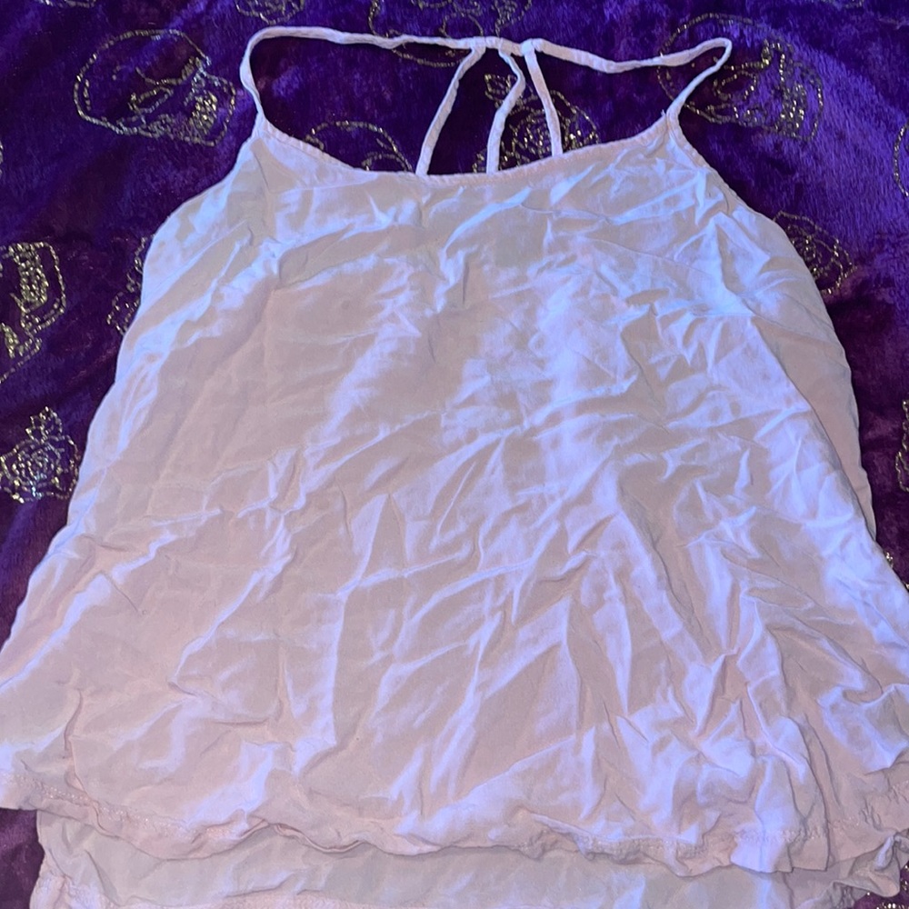 Light pink flow top with side slits